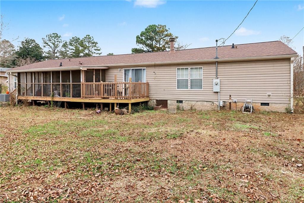 99 James Drive Hampton, GA 30228 - Photo 23 of 25 a front view of a house with balcony