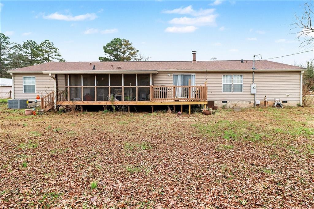 99 James Drive Hampton, GA 30228 - Photo 24 of 25 a front view of a house with garden