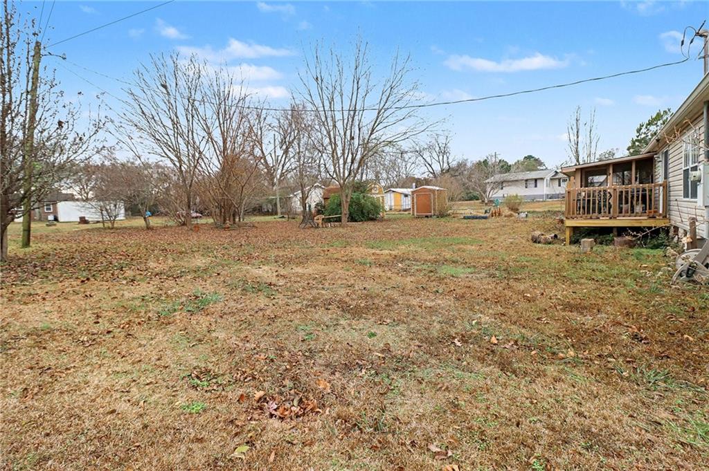 99 James Drive Hampton, GA 30228 - Photo 25 of 25 a view of a backyard of the house
