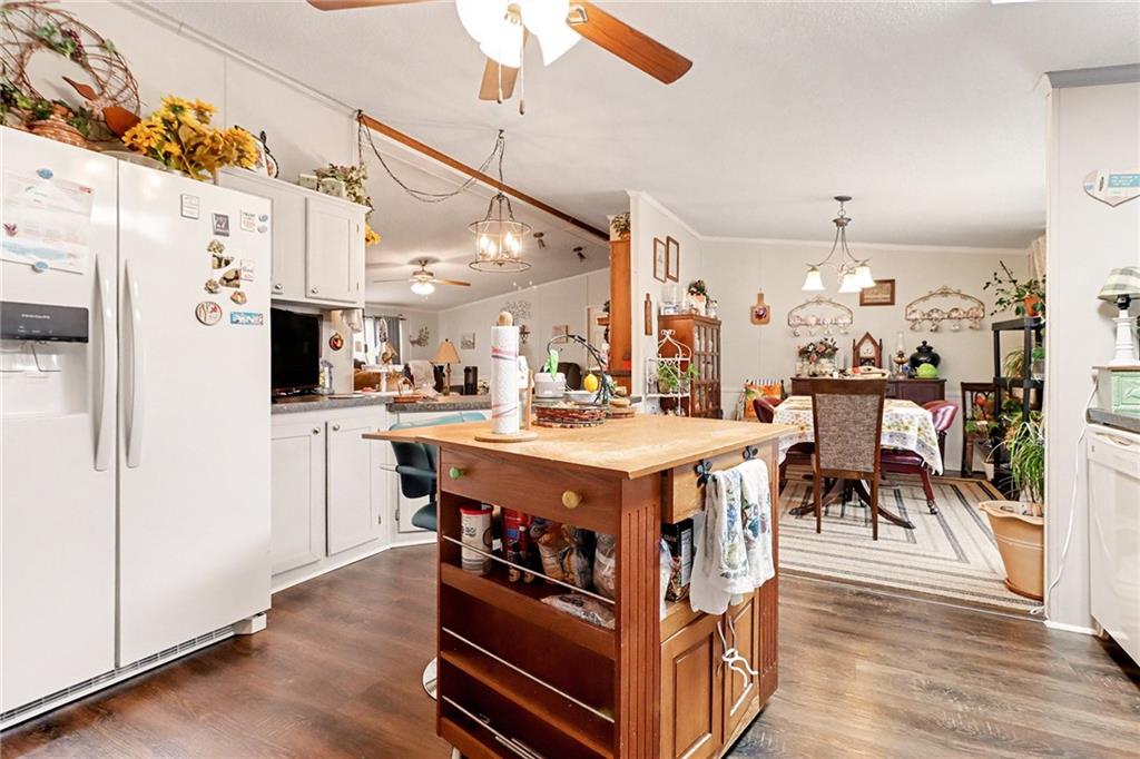 99 James Drive Hampton, GA 30228 - Photo 6 of 25 a view of a kitchen and dining room