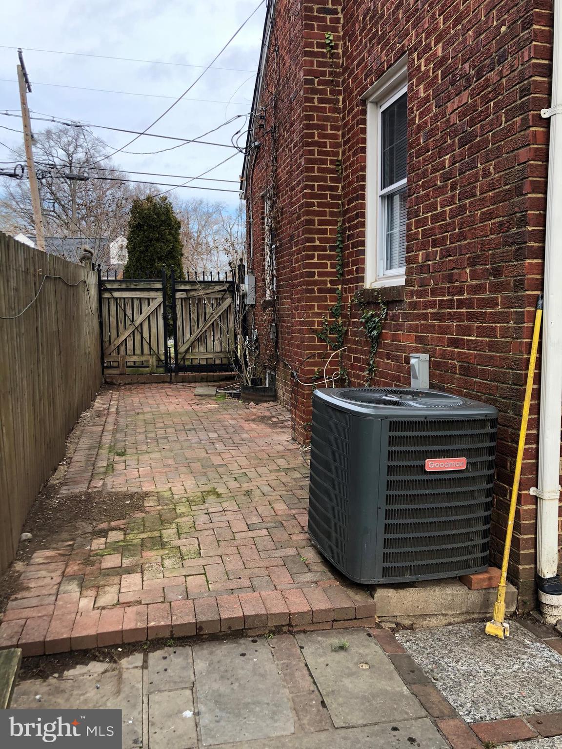 2407 Amherst Road Hyattsville, MD 20783 - Photo 41 of 57 Back yard HVAC area, gated side patio for pets