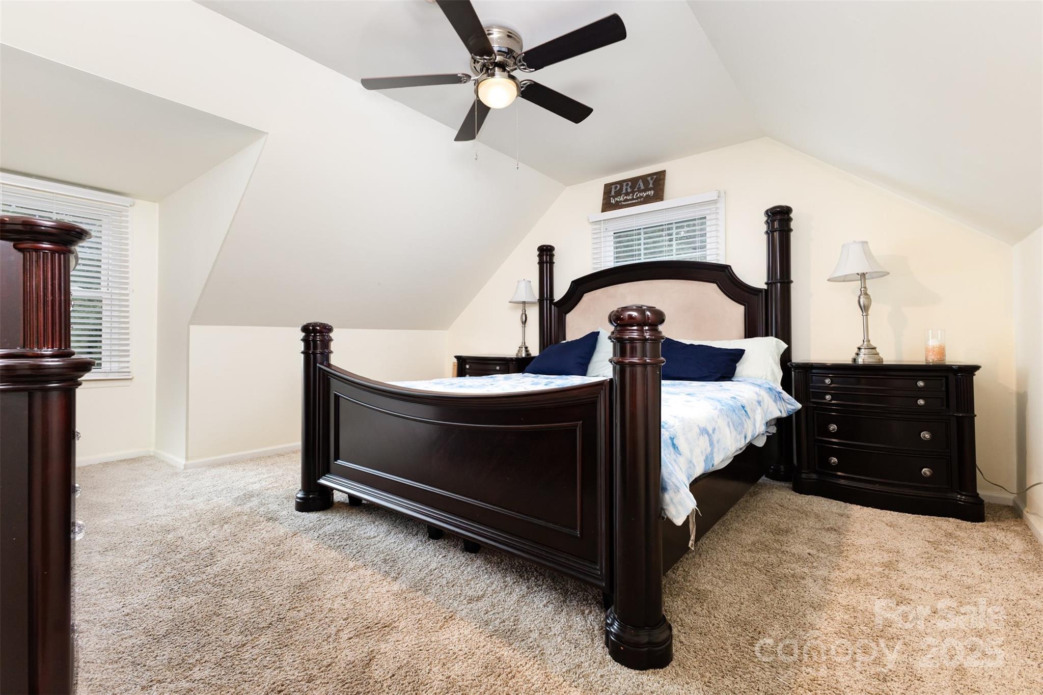 526 Rock Springs Road Lancaster, SC 29720 - Photo 12 of 22 a bed room with a bed and a ceiling fan
