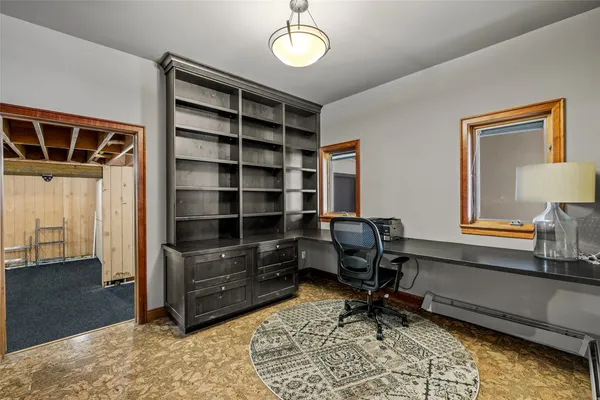 a room with furniture and a window