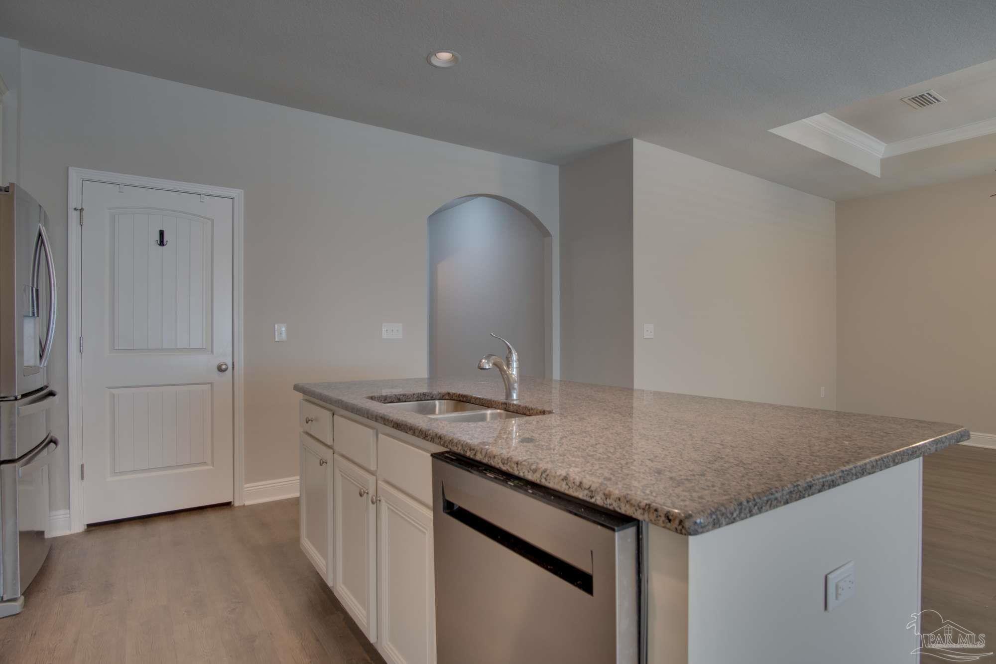 6239 Ladera Trail Pace, FL 32571 - Photo 13 of 27 a bathroom with a granite countertop sink and a mirror