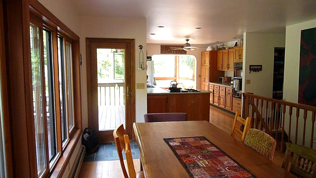 433 Main Road Savoy, MA 01256 - Photo 6 of 19 a view of a hallway with furniture and floor to ceiling window