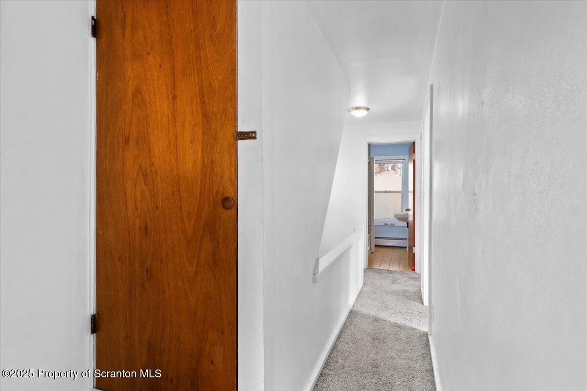 76 Mary Street Ashley, PA 18706 - Photo 17 of 30 a view of a room with door