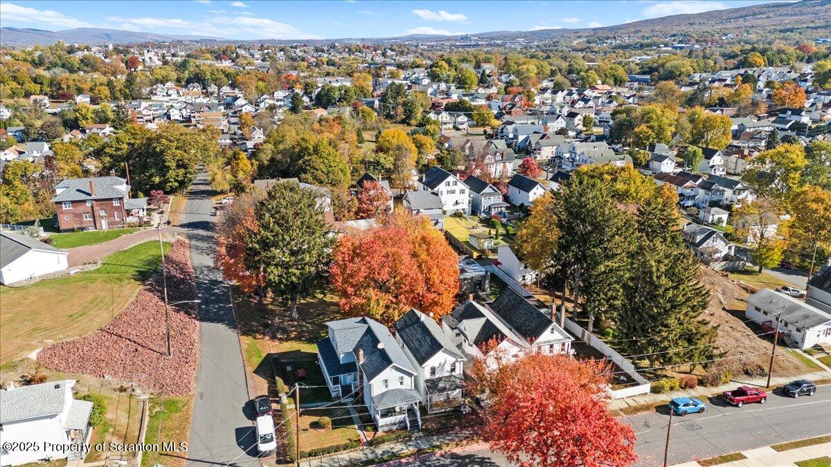 76 Mary Street Ashley, PA 18706 - Photo 29 of 30 an aerial view of residential houses with outdoor space