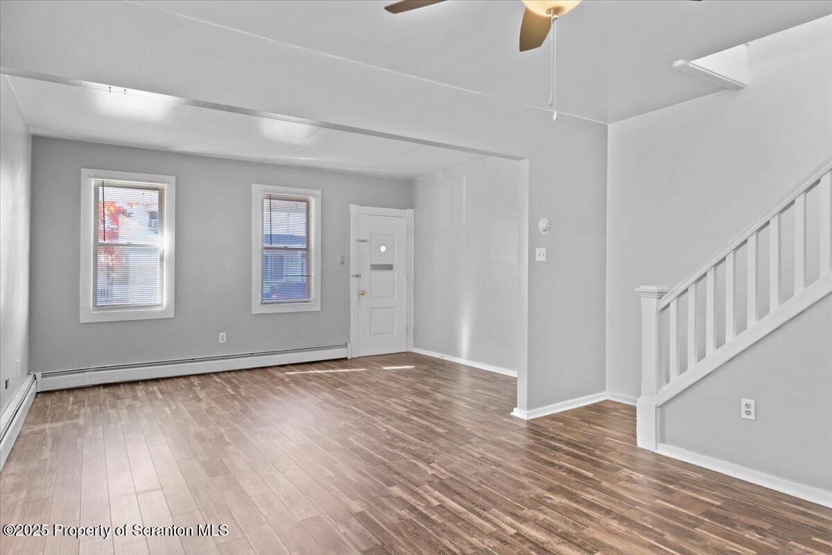 76 Mary Street Ashley, PA 18706 - Photo 10 of 30 a view of an empty room with wooden floor