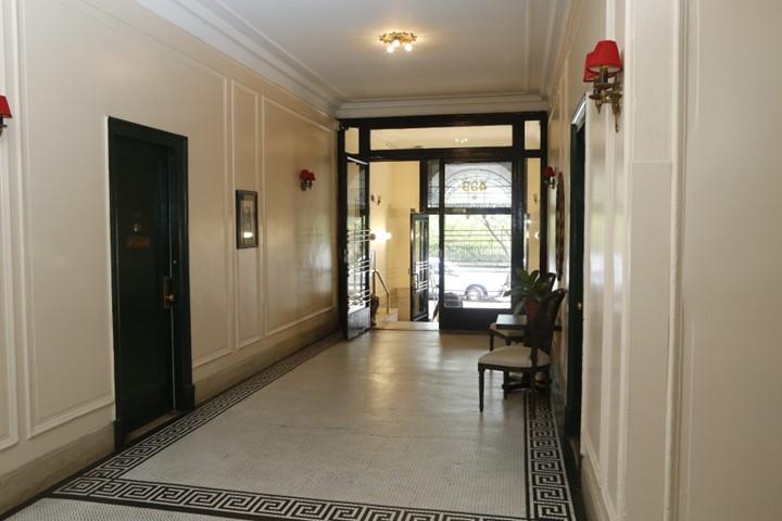 409 Edgecombe Avenue, Unit 1D Manhattan, NY 10032 - Photo 8 of 8 a lobby with furniture and floor to ceiling window