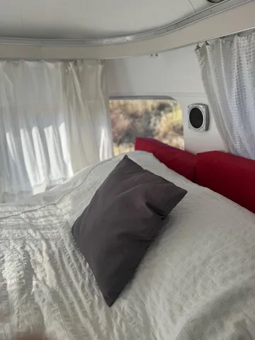 a view of a living room and window