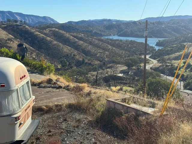 a view of a mountain from a yard