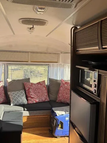 a room with furniture and a large window