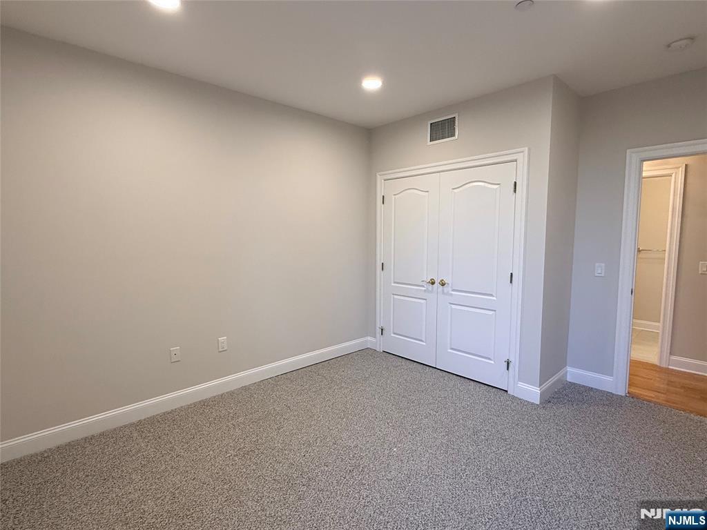 3104 Rio Vista Drive, Unit 3104 Mahwah, NJ 07430 - Photo 19 of 32 a view of an empty room