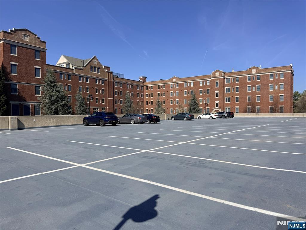 3104 Rio Vista Drive, Unit 3104 Mahwah, NJ 07430 - Photo 23 of 32 a view of city with tall buildings