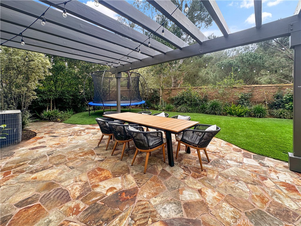 38 Arcade Irvine, CA 92603 - Photo 21 of 40 a patio with garden table and chairs