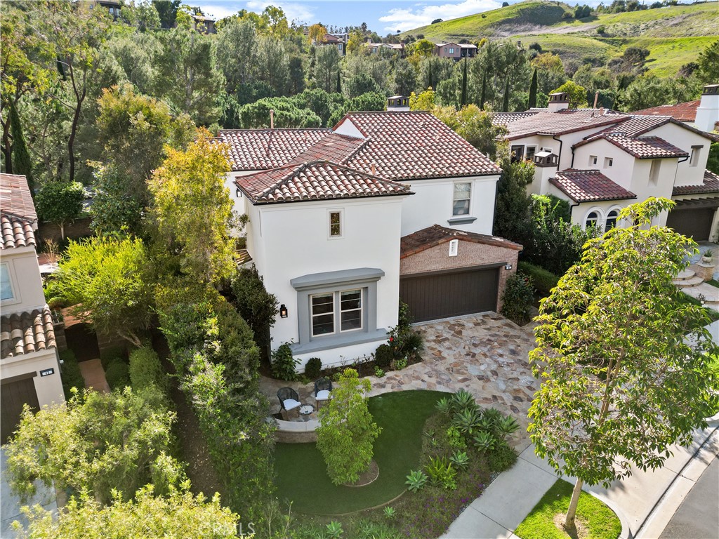 38 Arcade Irvine, CA 92603 - Photo 30 of 40 a view of a house with a garden