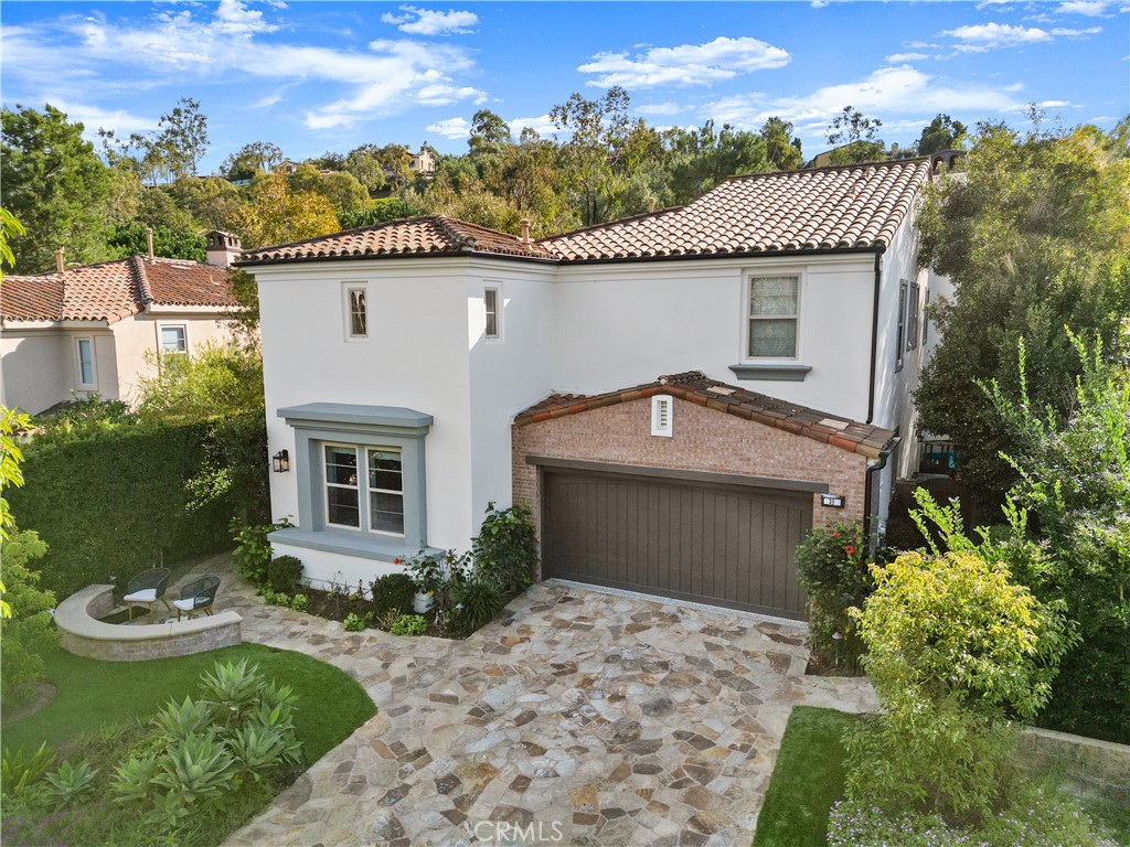 38 Arcade Irvine, CA 92603 - Photo 31 of 40 a front view of a house with garden