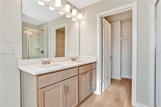a bathroom with a sink a vanity and a mirror