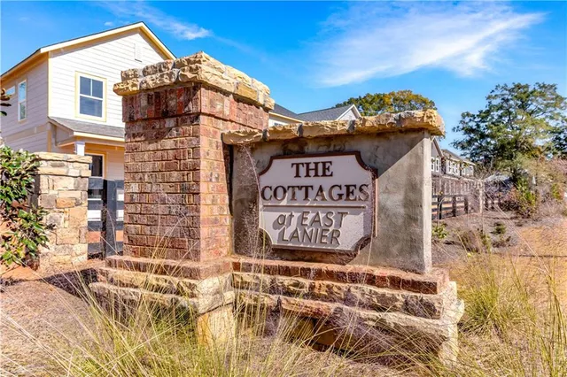 a sign on a pole on a street