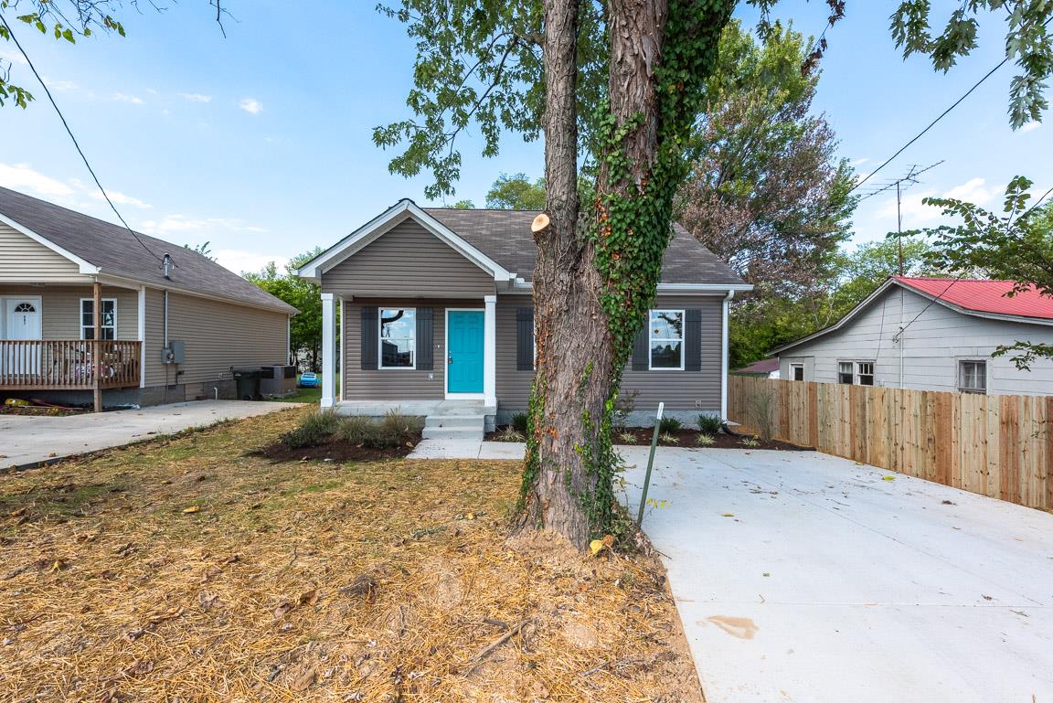 805 East 17th Avenue Springfield, TN 37172 - Photo 3 of 14 A Concrete Drive and Sidewalk lead to the home!