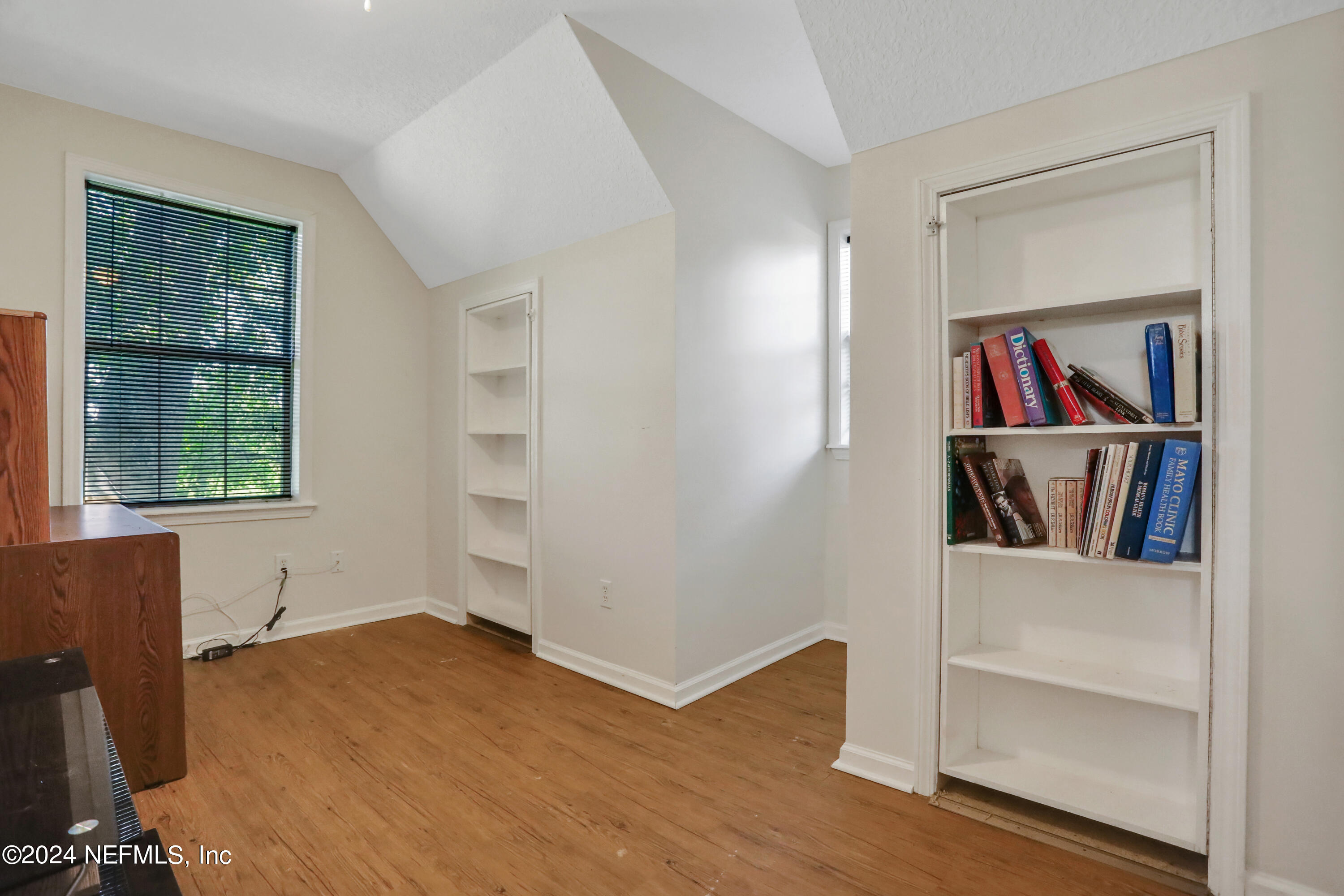 5321 Sweat Road Green Cove Springs, FL 32043 - Photo 23 of 31 a view of room with window and wooden floor