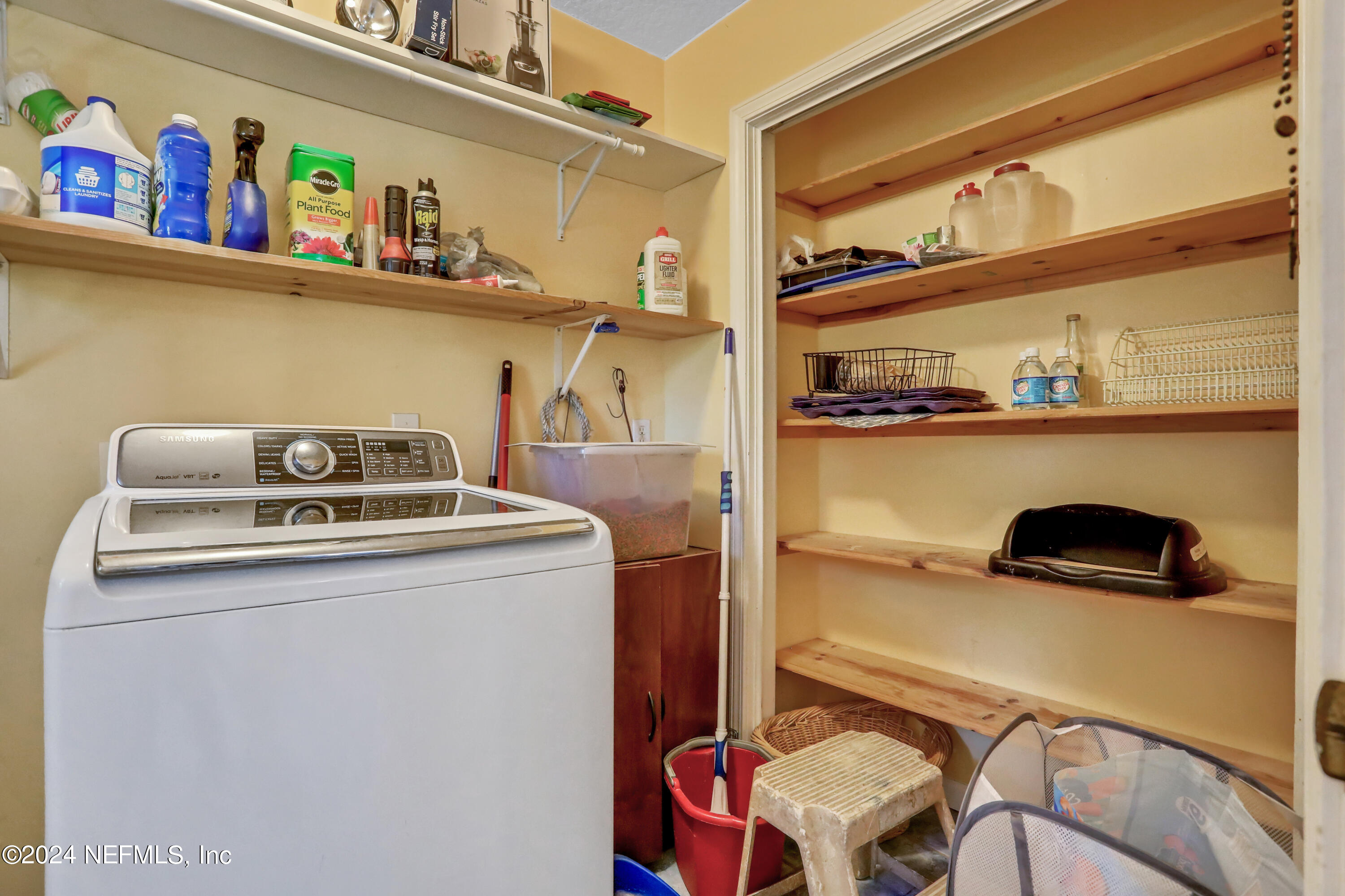 5321 Sweat Road Green Cove Springs, FL 32043 - Photo 31 of 31 a utility room with dryer washer and other items