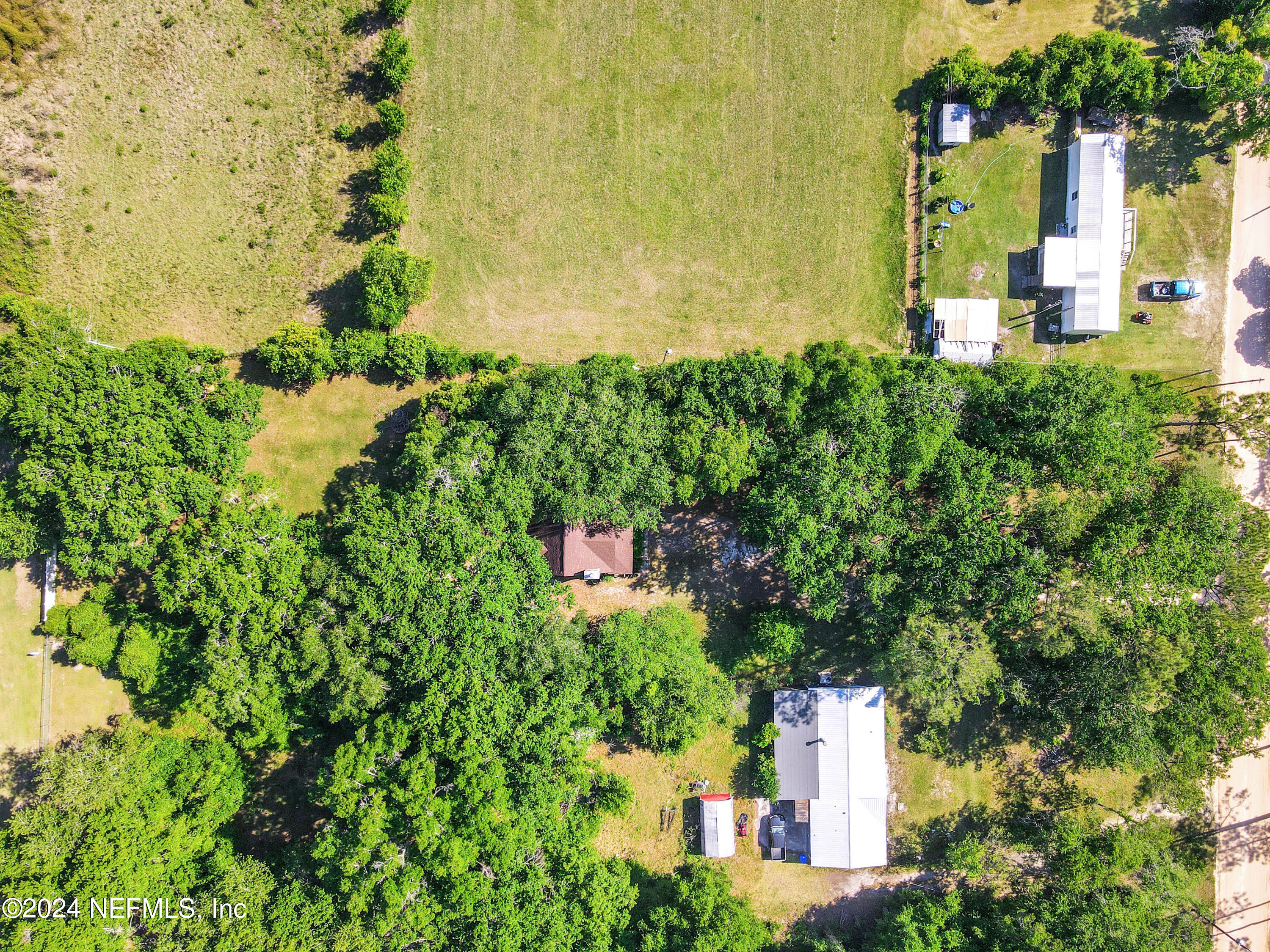 5321 Sweat Road Green Cove Springs, FL 32043 - Photo 7 of 31 an aerial view of a house with a yard swimming pool and outdoor seating