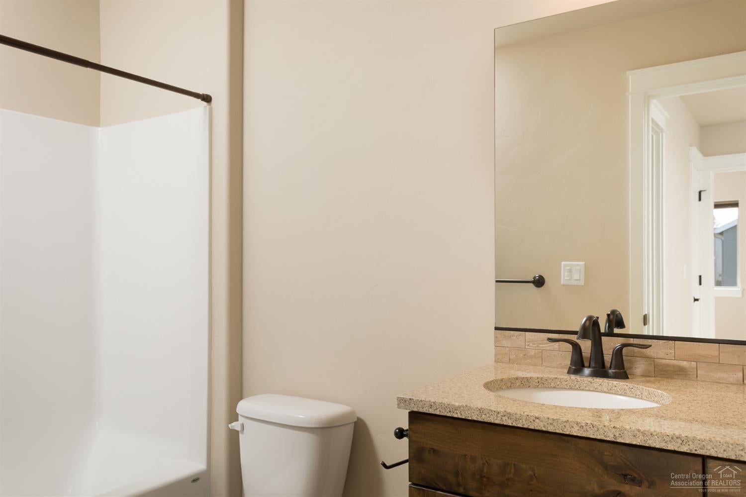 20945 Sotra Loop Bend, OR 97702 - Photo 16 of 25 Upstairs bathroom with shower/bath combo