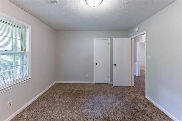 an empty room with windows