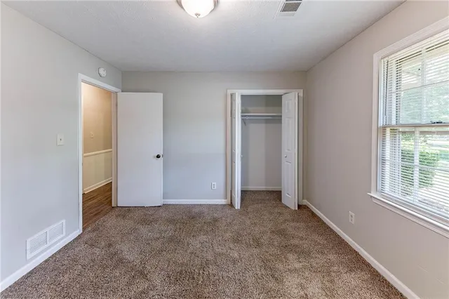 an empty room with windows