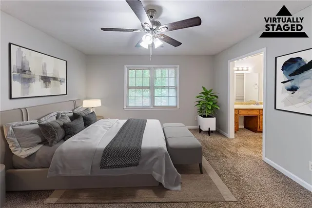 a spacious bedroom with a bed a dresser and potted plant