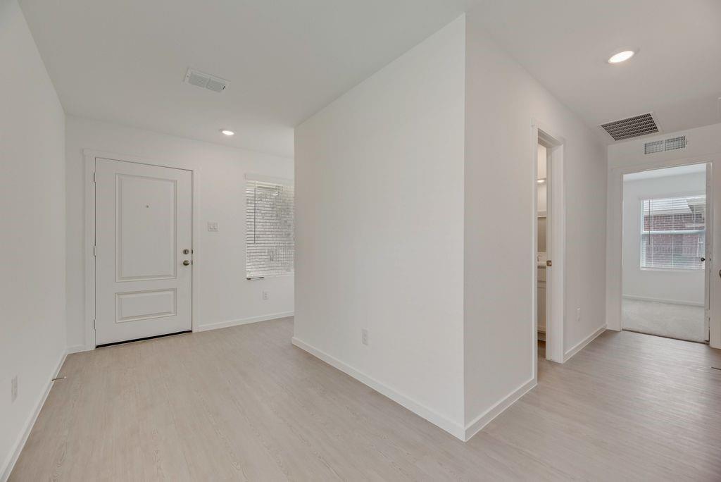 109 Pecan Flts Road Balch Springs, TX 75181 - Photo 12 of 26 a view of an empty room