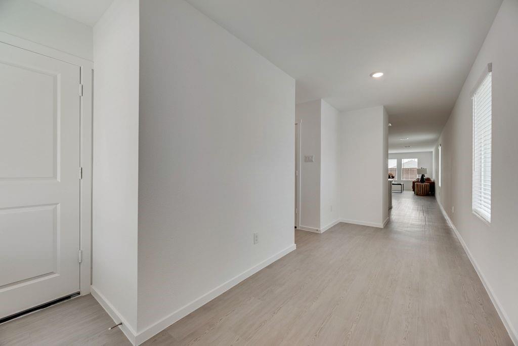 109 Pecan Flts Road Balch Springs, TX 75181 - Photo 13 of 26 a view of a livingroom and a hallway