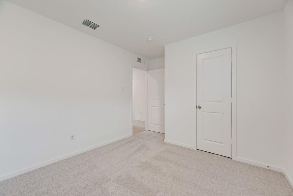 109 Pecan Flts Road Balch Springs, TX 75181 - Photo 25 of 26 a view of an empty room