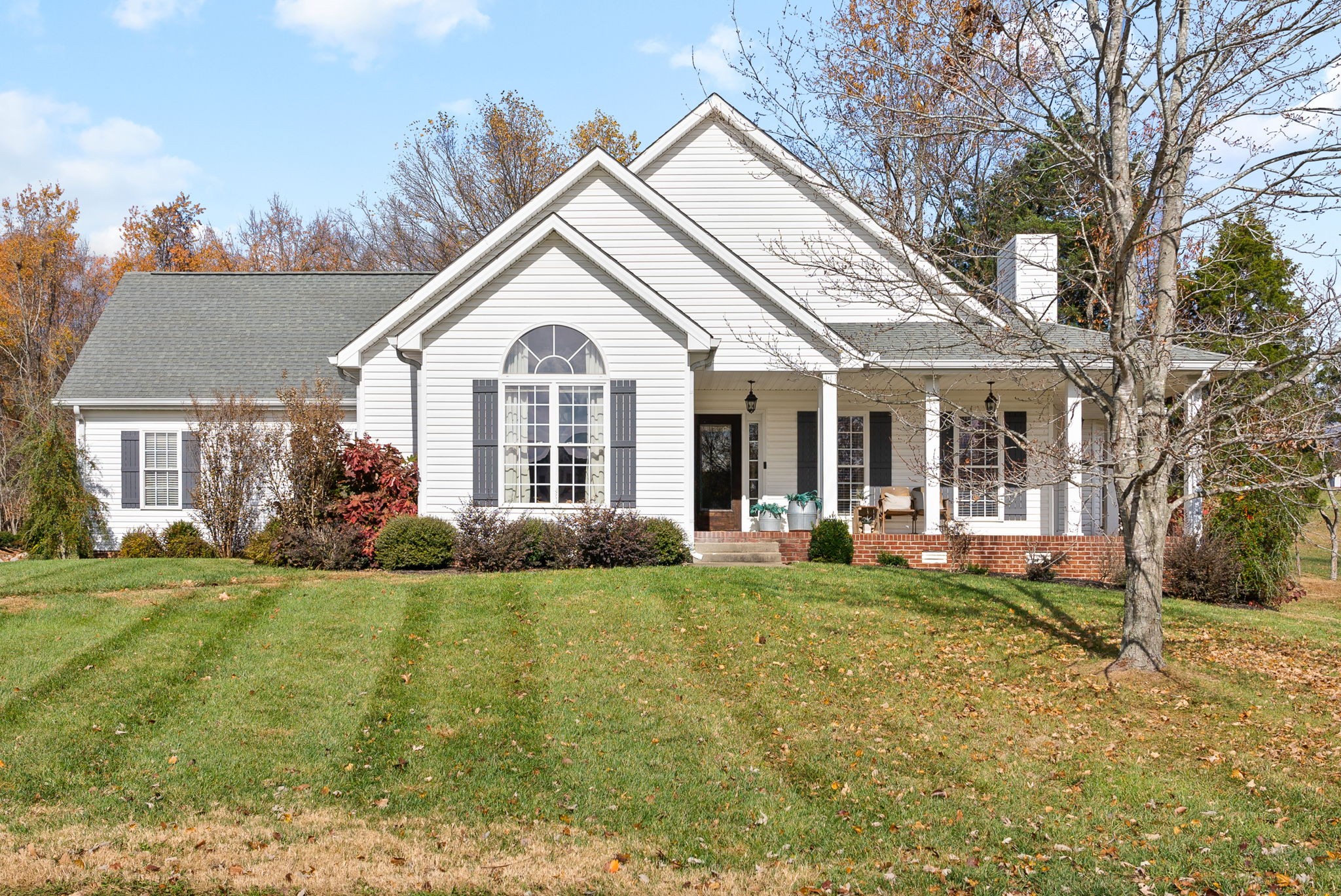 3571 Rabbit Run Trail Clarksville, TN 37043 - Photo 1 of 39 a front view of a house with a garden and trees