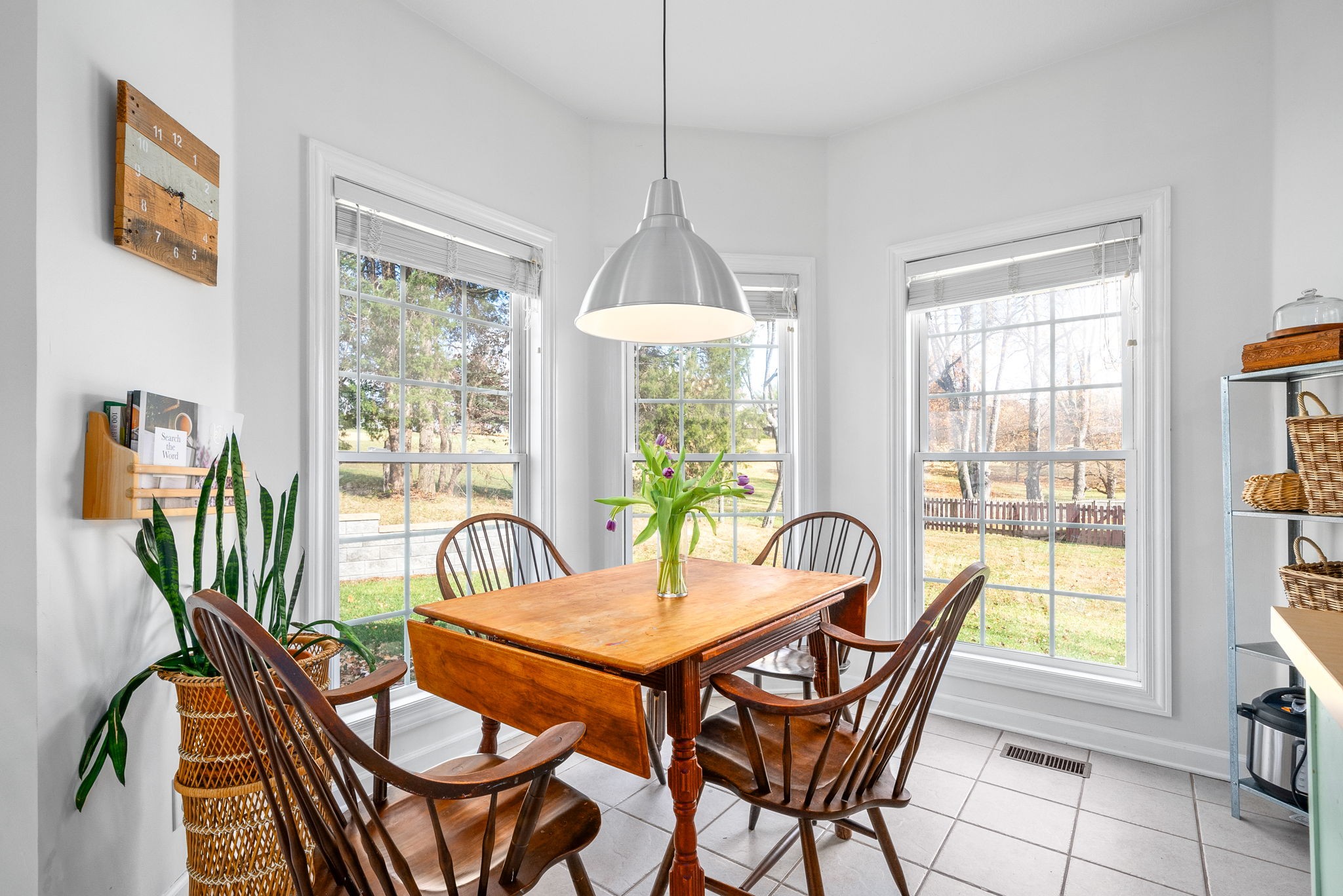 3571 Rabbit Run Trail Clarksville, TN 37043 - Photo 16 of 39 a dining room with furniture a chandelier and wooden floor