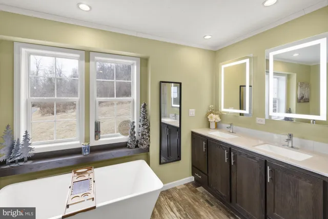 a bathroom with a bathtub and a sink