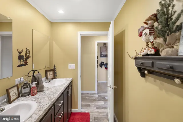 a bedroom with a bed and a tv