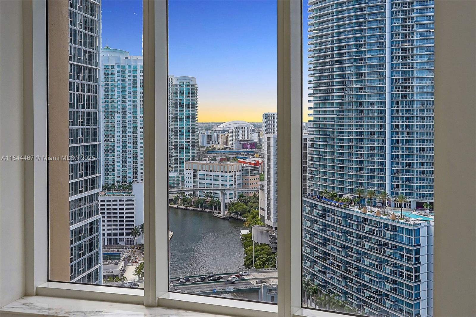 901 Brickell Key Boulevard, Unit 3204 Miami, FL 33131 - Photo 22 of 54 a view of a city from a balcony