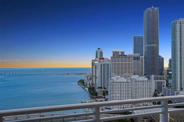a view of a city with tall buildings