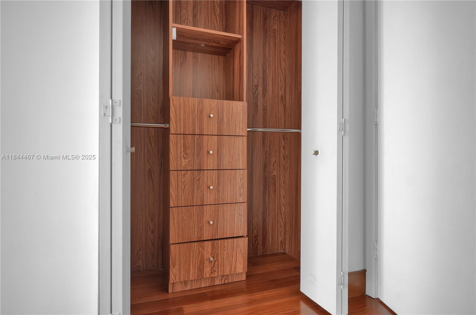 901 Brickell Key Boulevard, Unit 3204 Miami, FL 33131 - Photo 32 of 54 a bathroom with a glass door