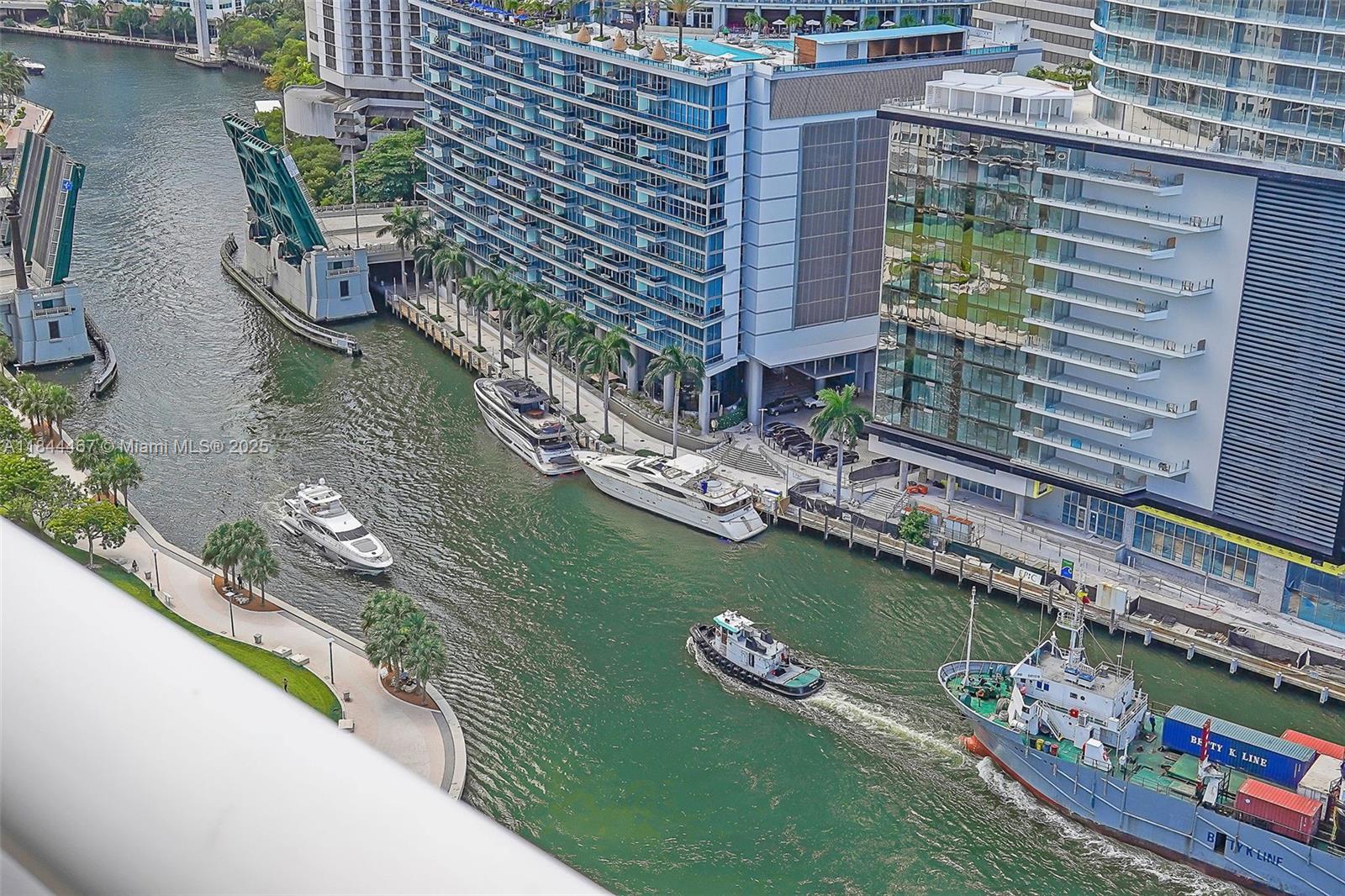 901 Brickell Key Boulevard, Unit 3204 Miami, FL 33131 - Photo 40 of 54 a aerial view of a house with a lake view
