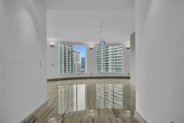 a view of balcony with wooden floor