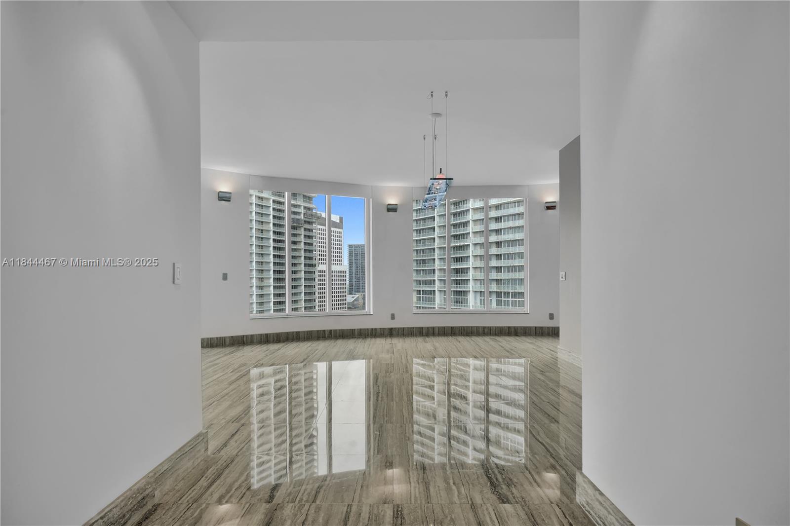901 Brickell Key Boulevard, Unit 3204 Miami, FL 33131 - Photo 5 of 54 a view of balcony with wooden floor