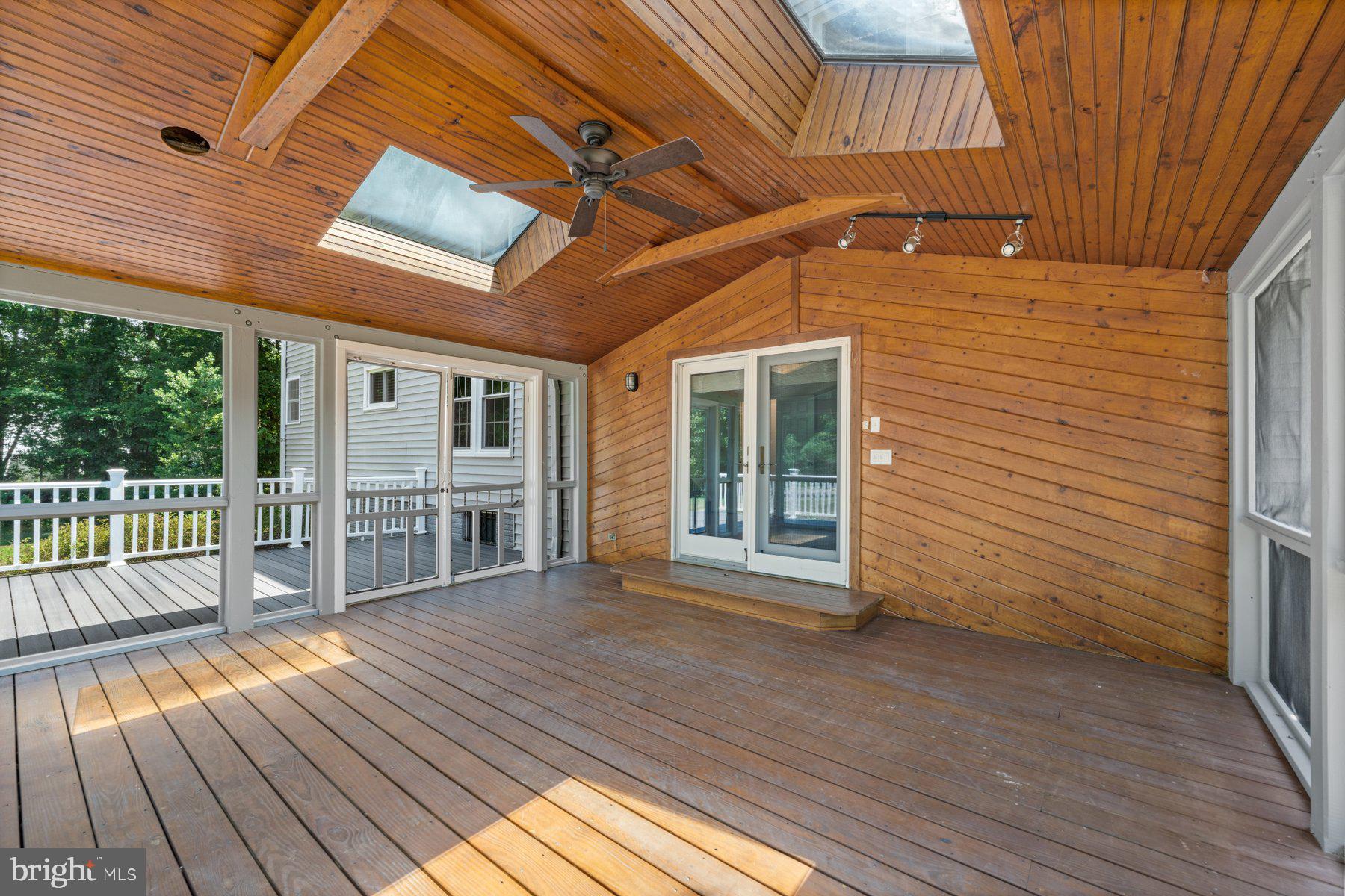 301 Saddle Ridge Road Annapolis, MD 21403 - Photo 16 of 47 Screened in porch with outdoor electric