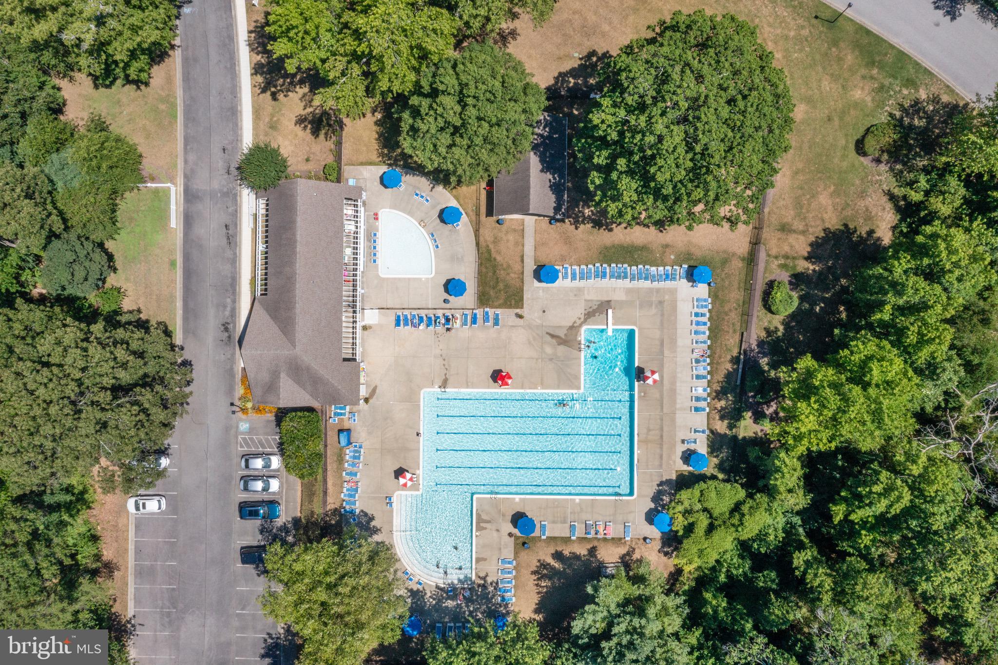 301 Saddle Ridge Road Annapolis, MD 21403 - Photo 41 of 47 Community pool with parking and basket ball hoop