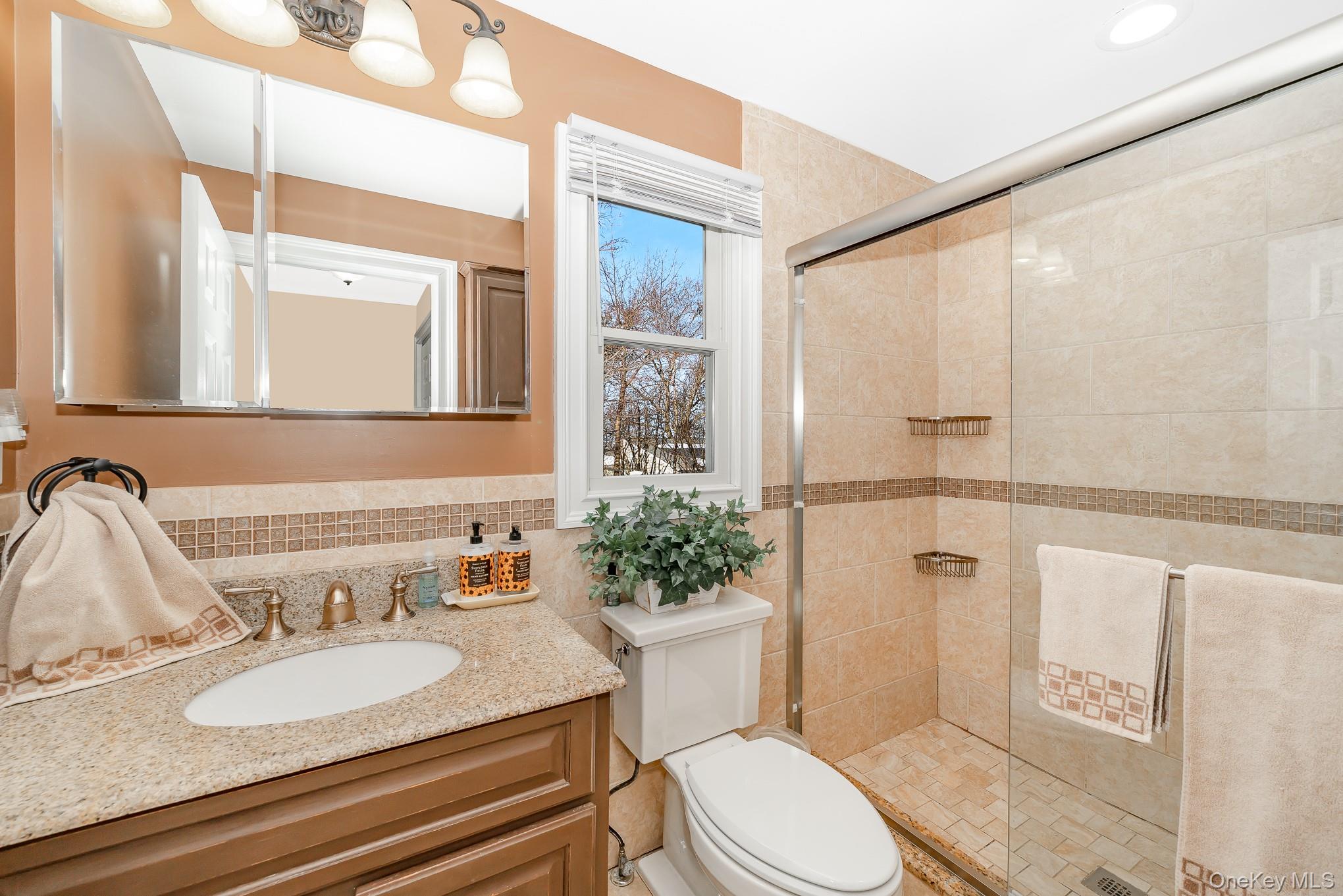 25 Old Mill Road Merrick, NY 11566 - Photo 11 of 19 1st Floor Bathroom