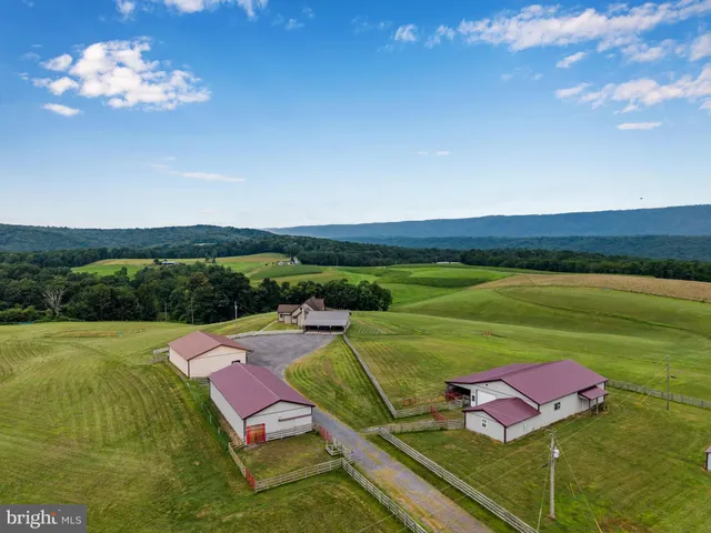a view of a golf course with a houses