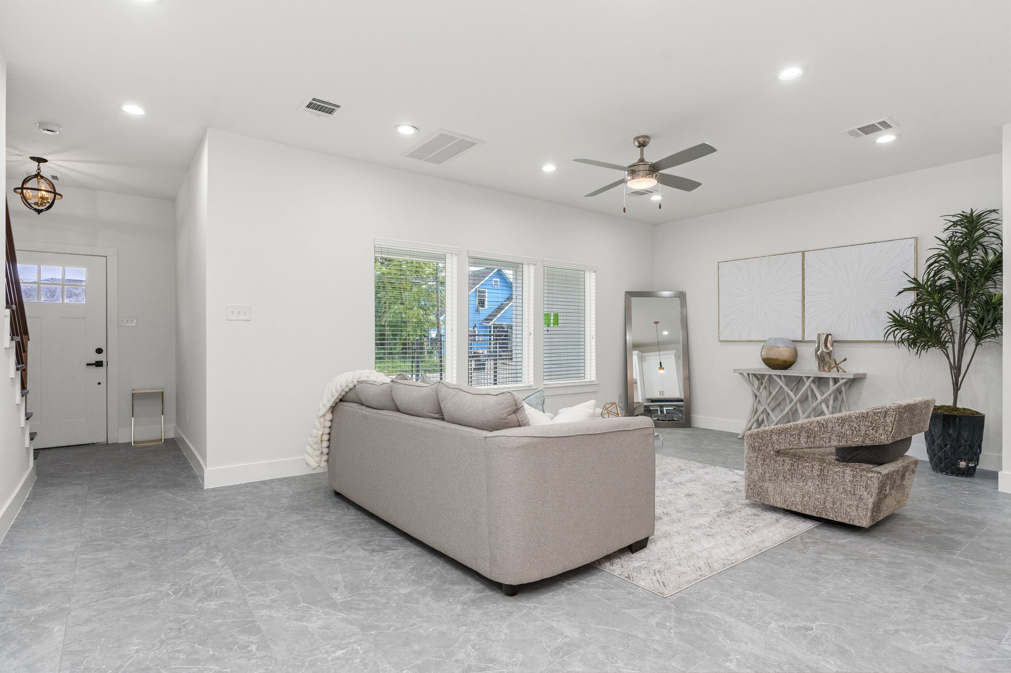 1517 Egypt Street Houston, TX 77009 - Photo 13 of 46 a living room with furniture and a large window