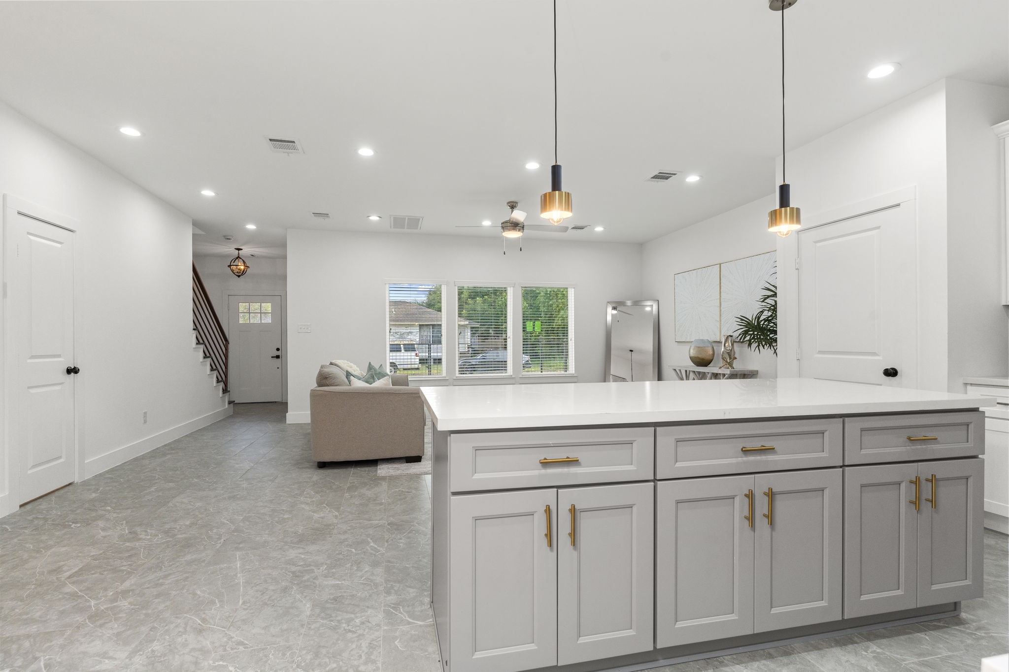 1517 Egypt Street Houston, TX 77009 - Photo 22 of 46 a kitchen with white cabinets and sink